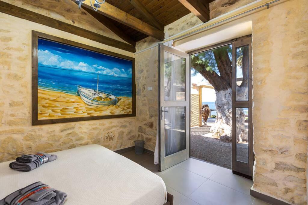 Villa Proto Helidoni - A Cozy Beachfront Villa Petres  Bagian luar foto